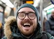 man smiling in a bus