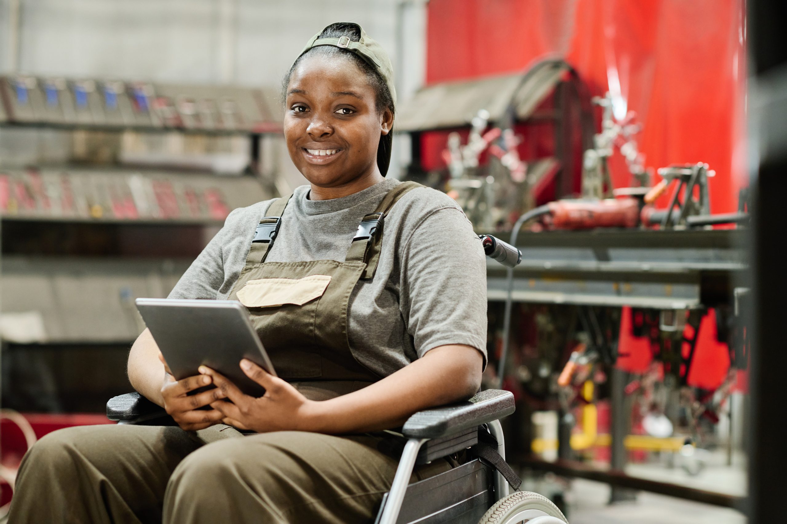 Woman with disability working at factory